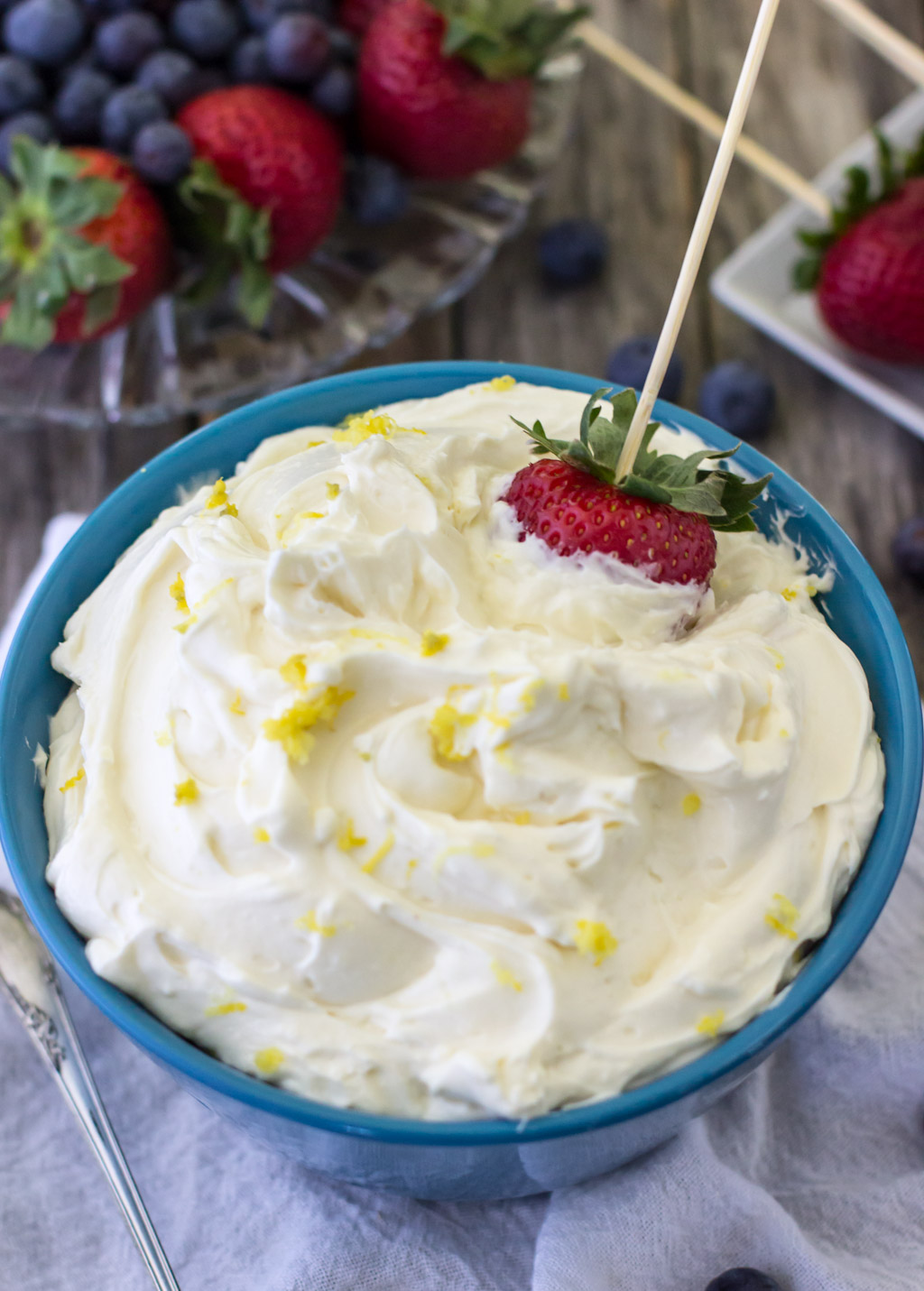 A little sweet and a little tart, this lemon cheesecake dip is the perfect accessory to your next party, cookout, or potluck!
