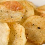 Bowl of homemade potato chips.