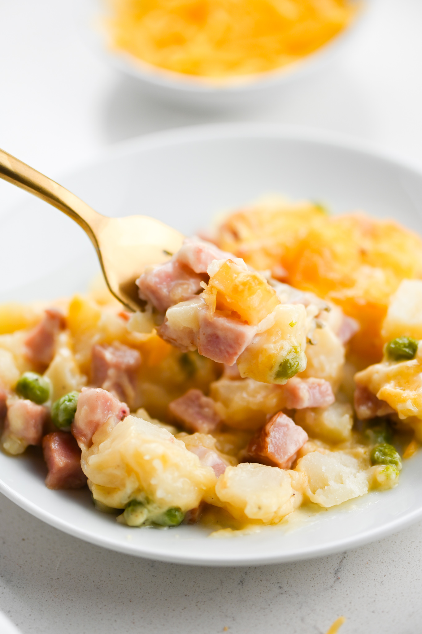 https://www.lifesambrosia.com/wp-content/uploads/Cheesy-Ham-Potato-Casserole-Recipe-08.jpg