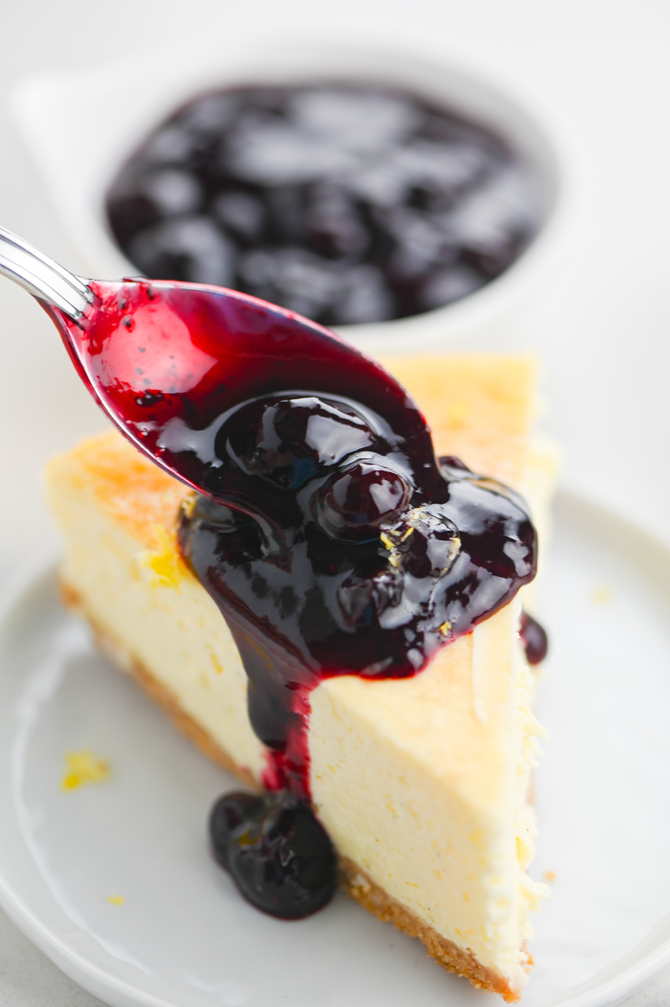 Vanilla Bean Cheesecake with Blueberry Sauce - Life's Ambrosia